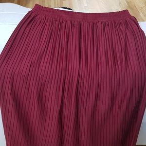 Pleated maroon skirt